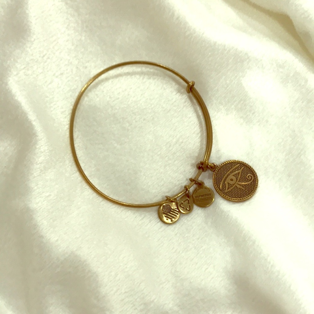 Gold tone eye of Horus Alex & Ani bracelet